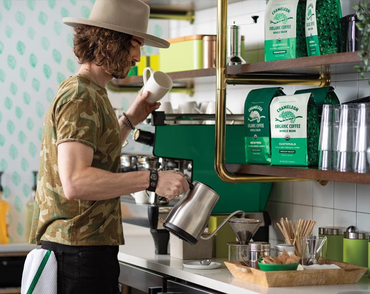 Barista brews Chameleon organic espresso